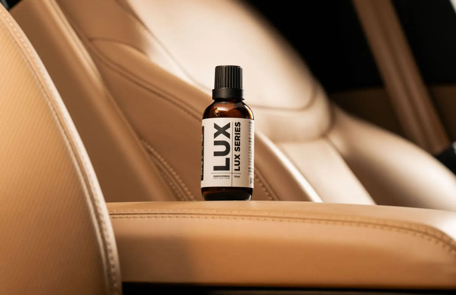 Lux Series bottle on car seat.