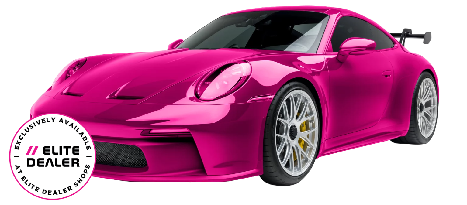 Pink sports car with Elite Dealer badge.