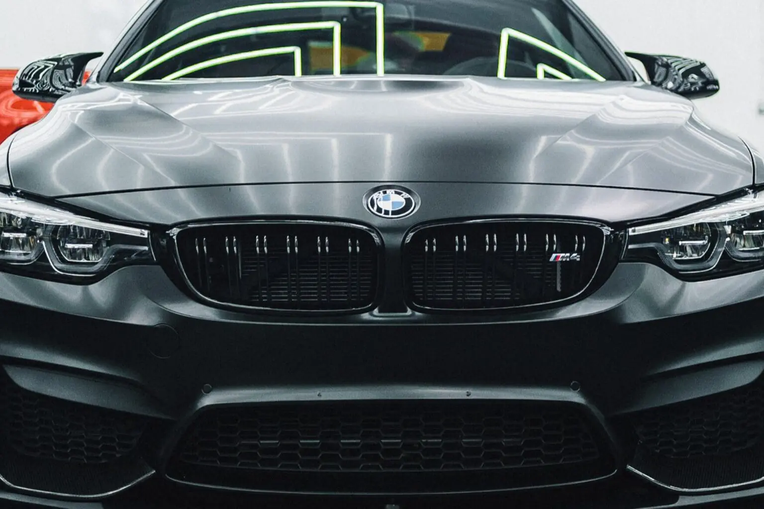 Front view of a black BMW car.