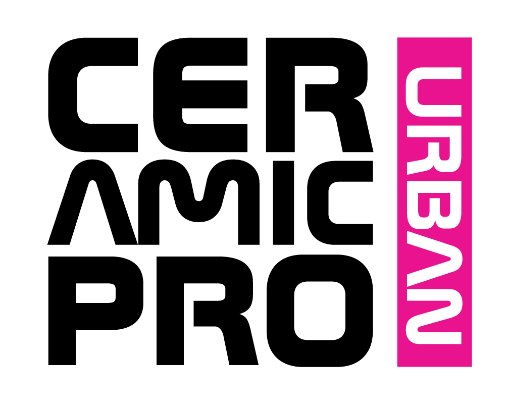 Urban logo in pink on black background.